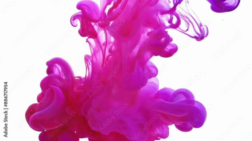 Poster pink ink swirls and mixes with water, creating a vibrant abstract design.