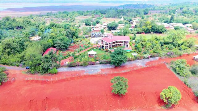 Aerial view of a bungalow with swimming pool