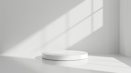 A round white podium in a minimalist setting