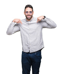 Young handsome man wearing sunglasses over isolated background looking confident with smile on...
