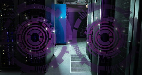 Image of two purple round scanner spinning against computer server room