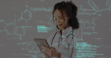 Image of scientific data over biracial female doctor