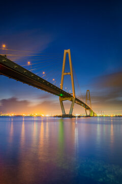 Fototapeta Nagoya Port Toriton bridge across Ise Bay at night, Nagoya, Aichi, Honshu, Japan