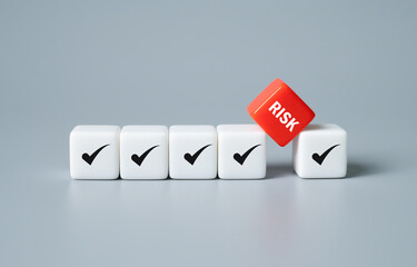 close up at the red cube  to identify red danger risk cube among other normal incident. Risk...