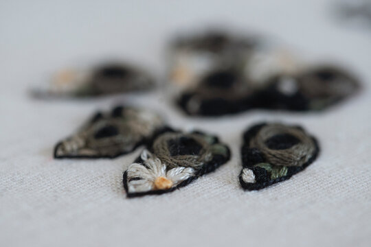 Close-up view of an embroidered cats paw print