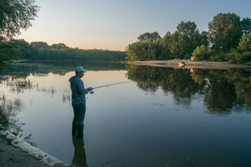 fisherman on the lake