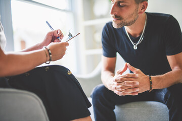 Man with psychologist theraphy social problems concept drug addiction talk to a psychological woman