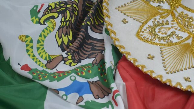 Mexican hat spinning on mexican flag. Cinco de Mayo, Mexican Independence Day background.