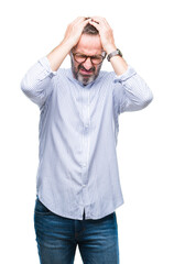 Middle age hoary senior man wearing glasses over isolated background suffering from headache desperate and stressed because pain and migraine. Hands on head.