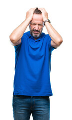 Fototapeta premium Middle age hoary senior man over isolated background suffering from headache desperate and stressed because pain and migraine. Hands on head.