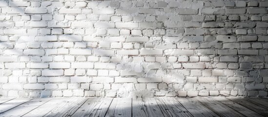 Background with a white brick wall providing empty space for text or images, also known as a copy space image.