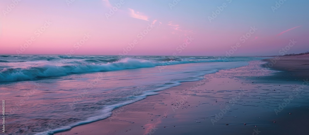 Poster seascape with a serene beach at sunset. the horizon filled with a blend of blue and pink hues, creat