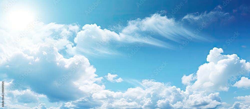 Poster sunny weather with bright blue sky and fluffy white clouds, ideal as a nature-themed background. the