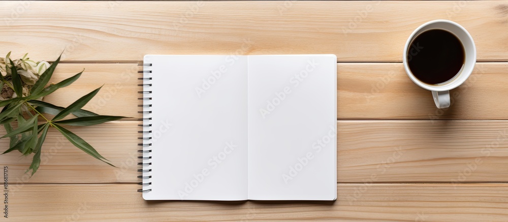 Leinwandbilder top view of wood office desk with blank notebook, pen, laptop, and supplies, creating a visually app