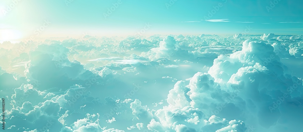 Poster copy space image of a pure environment concept with a turquoise sky, white fluffy clouds drifting sm