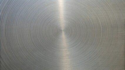 Obraz premium Shiny silver stainless steel plate with brushed texture, reflecting light,generative ai 