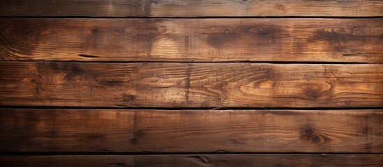 Naklejka premium The brown wooden board with copy space image.