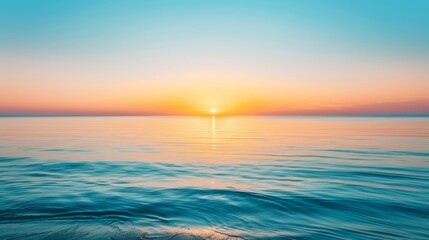  A large body of water mirroring the sun's descent in the sky, its radiance gleaming on the surface