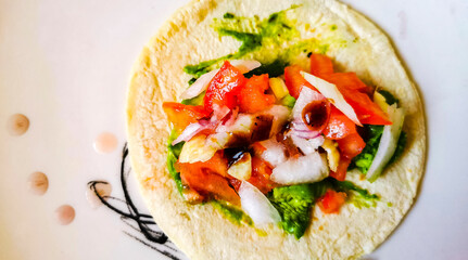 Eating Mexican vegan vegetarian tacos in the restaurant Mexico.