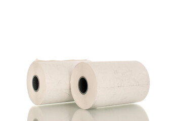 Two rolls of paper cash register tape, close-up isolated on white.