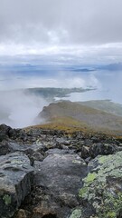 Clouds over the mountains in Senja Norway Sjursviktindan