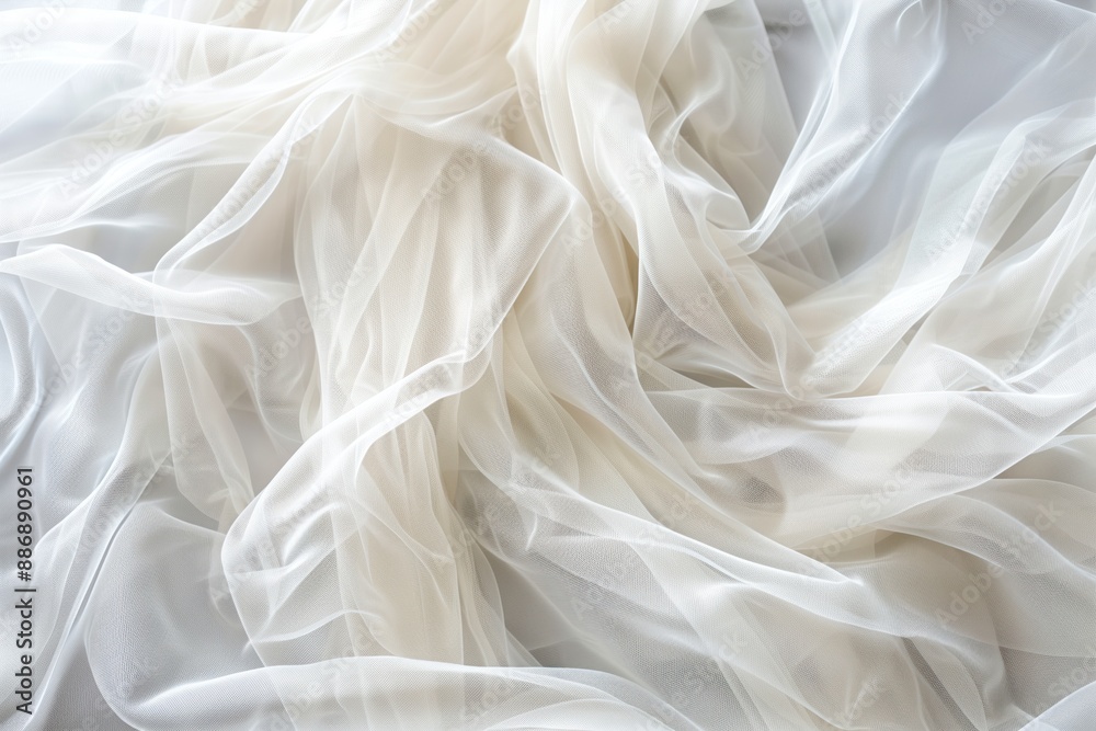 Poster Crumpled white fabric with subtle gray border. Close-up view of textured surface. Intimate atmosphere created by blurred background. Fabric texture suitable for wedding decorations or fashion design.