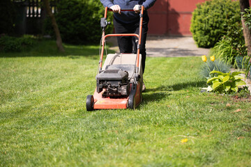 Lawn mover on green grass. Machine for cutting lawns.