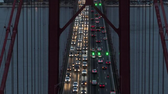 Traffic on the Ponte 25 de Abril bridge over the Tagus River in the evening, Lisbon, Portugal, Europe