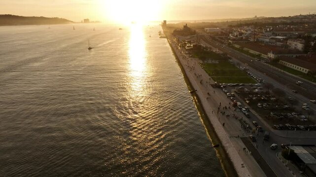 Evening promenade by Tagus river, Lisbon, Portugal, Europe