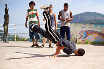 Group, break dancing and friends in park or outside, hip hop and art and movement for freestyle...