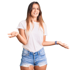 Beautiful caucasian woman wearing casual white tshirt smiling cheerful with open arms as friendly welcome, positive and confident greetings