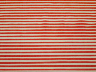 White and red striped thin cotton fabric, background
