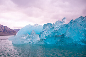 Stranded Iceberg broken off from glacier field floating around in Jokulsarlon in Iceland