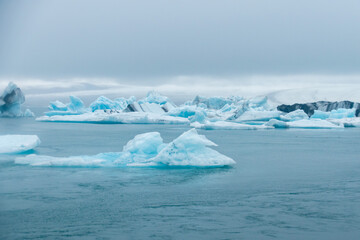 Stranded Iceberg broken off from glacier field floating around in Jokulsarlon in Iceland