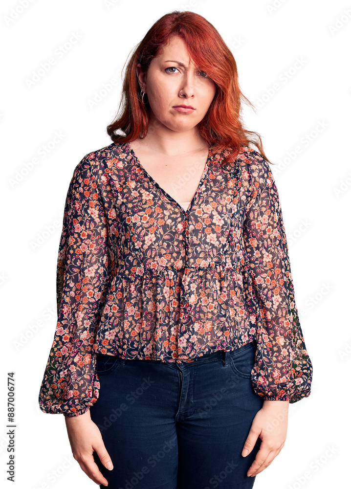 Sticker young beautiful redhead woman wearing casual t-shirt skeptic and nervous, frowning upset because of 