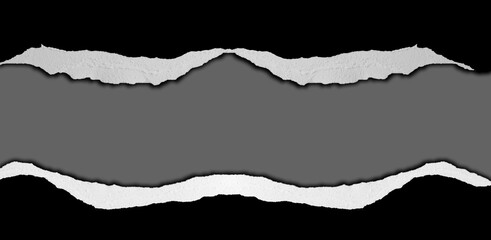 Ripped black paper on grey background