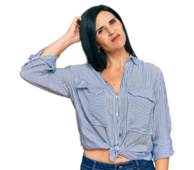 Young caucasian woman wearing casual clothes confuse and wondering about question. uncertain with doubt, thinking with hand on head. pensive concept.