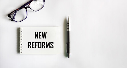 Text of new reforms. Business concept on white background. Copy space