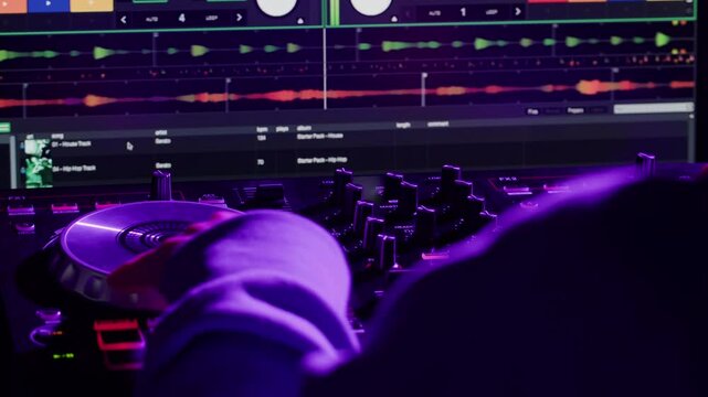 DJ playing music on festival in night club. Techno musician with headphones and sunglasses performing at nightclub for concert crowd of people, city bar.
