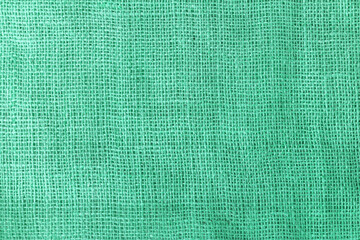texture fabric burlap for sewing green background color macro