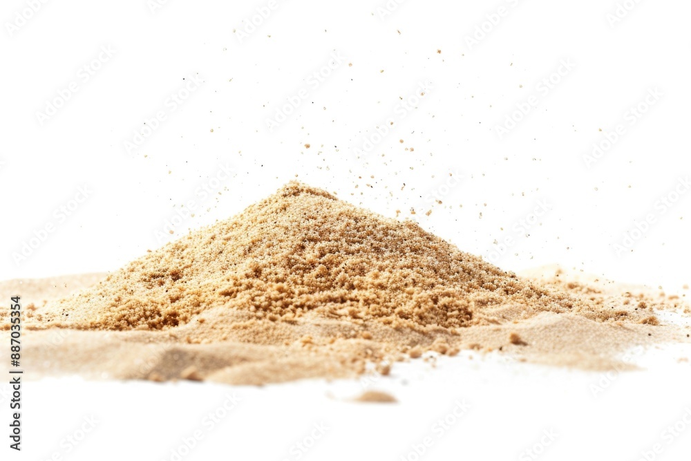Poster a pile of sand sits on top of a white surface, a simple yet intriguing scene
