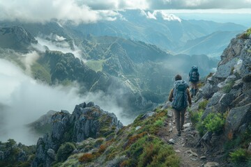 Hikers Traverse Rugged Mountain Trail in Misty Landscape