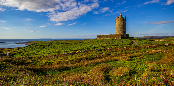 Doonagore castle tower in a setting sun, Co. Clare, Ireland