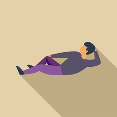 Young man is lying down on his back with his hand on his head