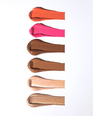 An elegant sample of a cosmetic swatch showcasing a rich shade and silky texture. Perfect for use in advertising campaigns, product catalogs, and sales presentations.