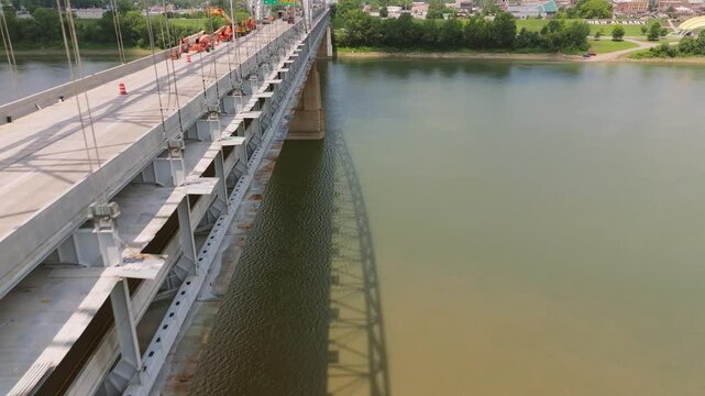 Aerial Drone Sherman Minton Bridge Ohio River Tilt up from River Fast Move Alongside Of Bridge (Bridge on Left)
