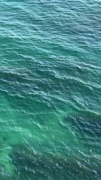 Sea blue shiny water beautiful seascape, vertical video