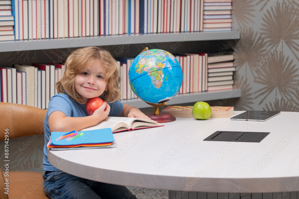 Poster school boy with books and apple in library. nerd school kid. clever child from elementary school wit