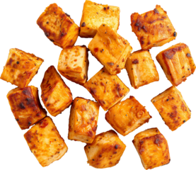 Crispy fried tofu cubes isolated on transparent background.