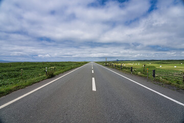 Hokkaido,Japan - July 10, 2024:  Beautiful road, Ororon Line, along the Sea of Japan in Hokkaido, Japan
